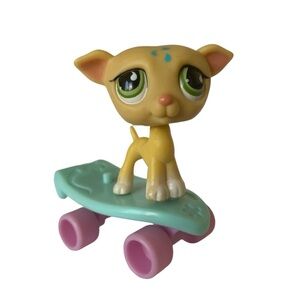 Littlest Pet Shop Greyhound dog #875 with a skateboard